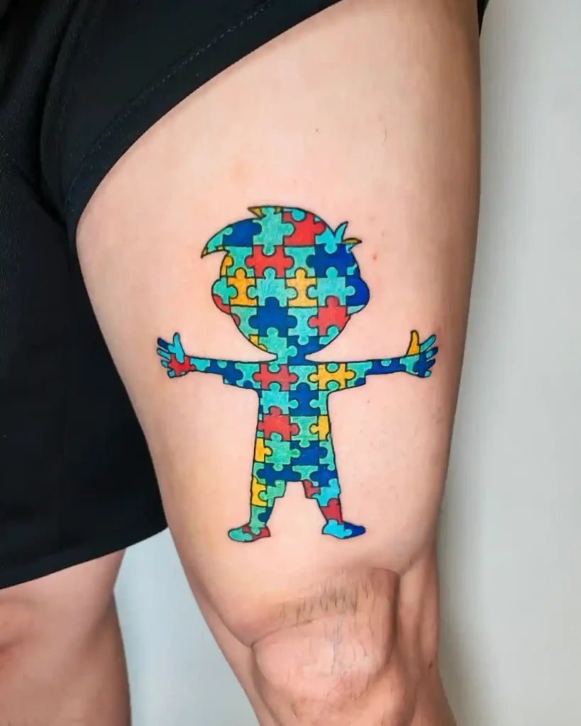 Colorful Autism Awareness Figure on Thigh