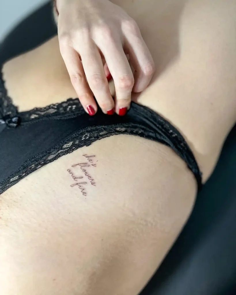 Cursive Script Quote on Hip and Thigh
