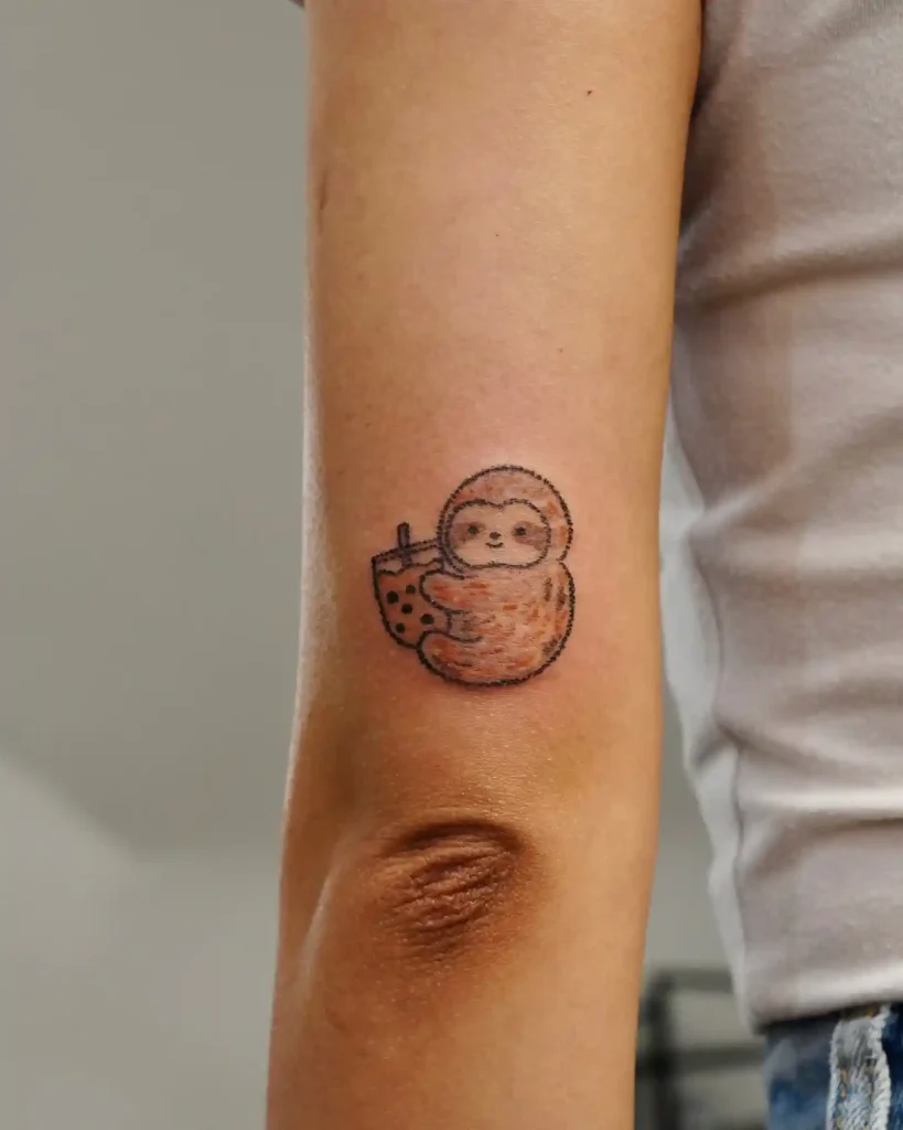 Cute Sloth Holding Boba Tea on Back of Upper Arm