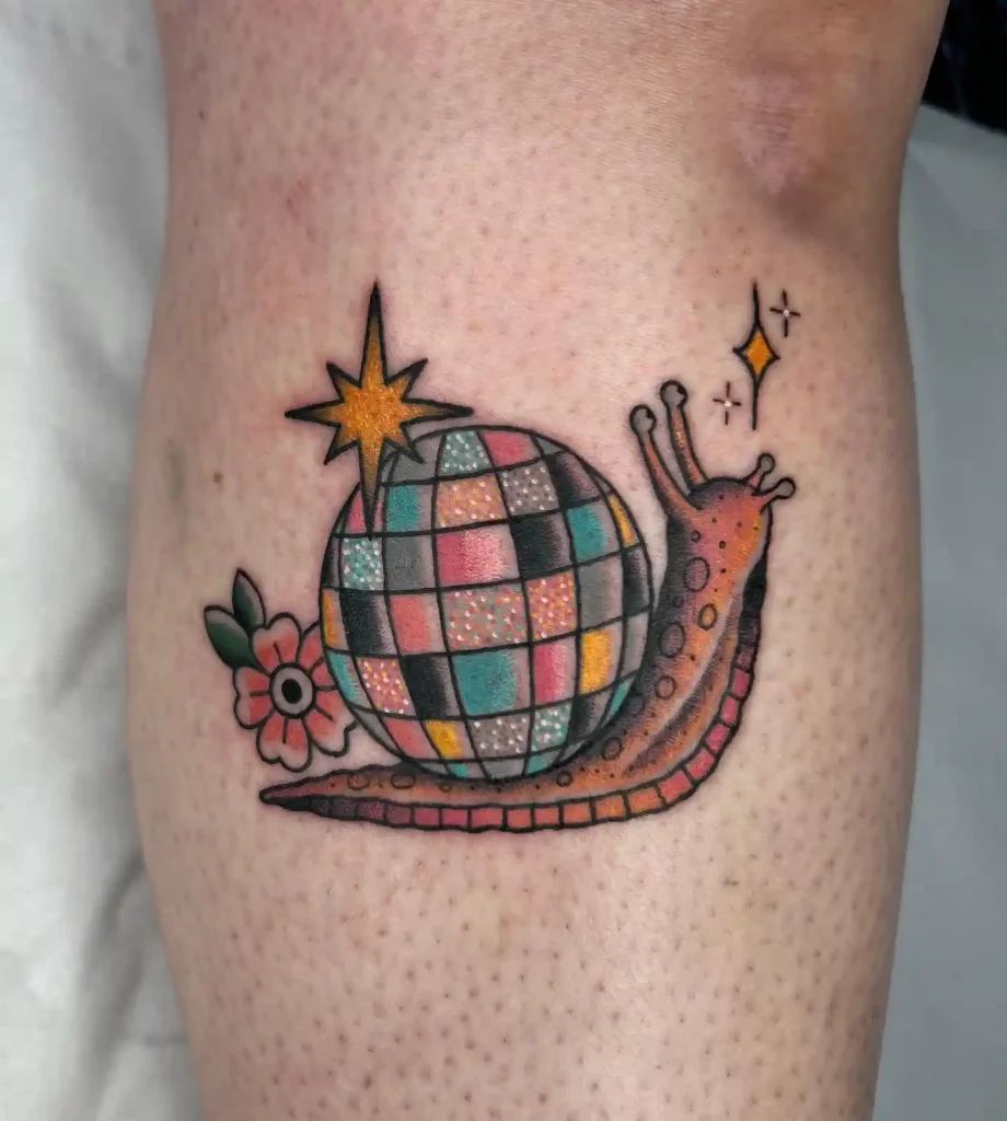 Disco Ball Snail Tattoo on Lower Leg