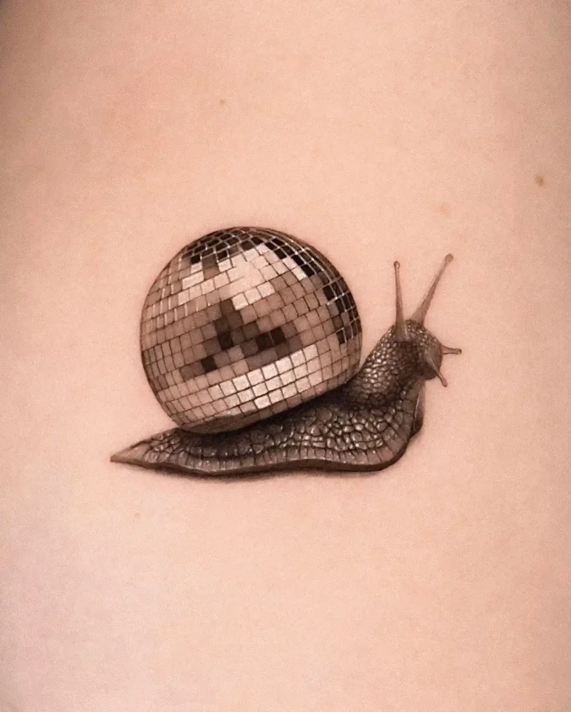 Disco Ball Snail on Arm