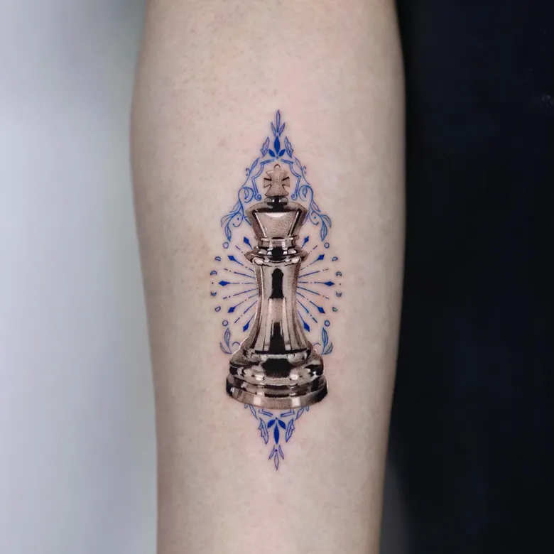 Elegant King Chess Tattoo with Fine Line Details