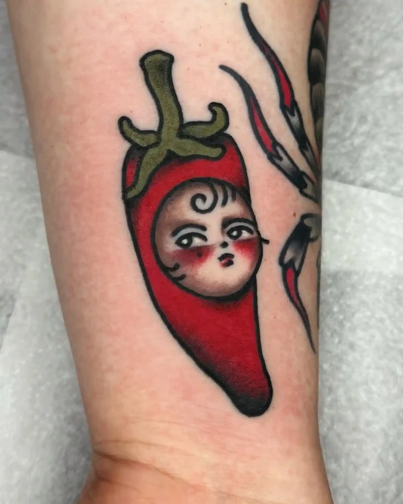 Kewpie Chili Pepper on Forearm