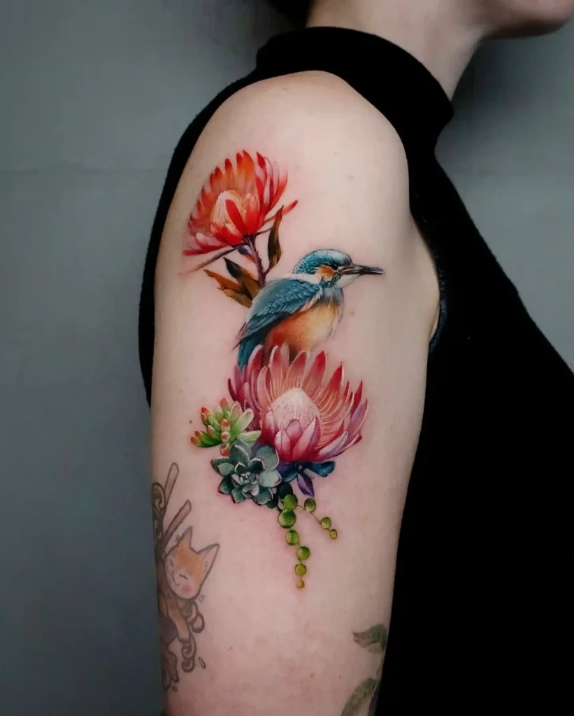 Kingfisher with Succulent and Protea Flowers on Upper Arm