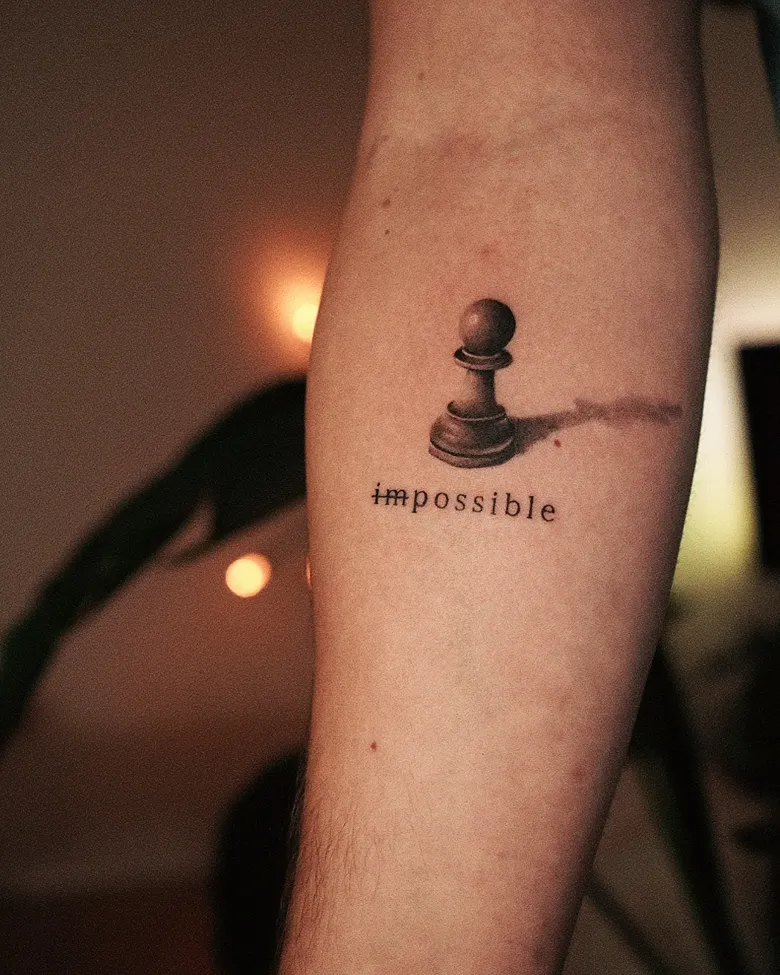 Minimal Pawn Tattoo with “Impossible” Concept