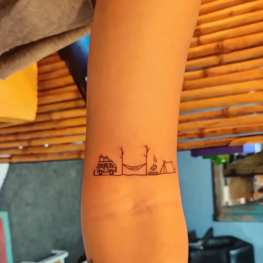 Minimalist Adventure Scene on Forearm
