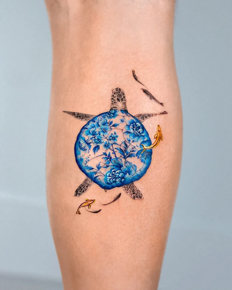 Porcelain Turtle Tattoo with Golden Fish