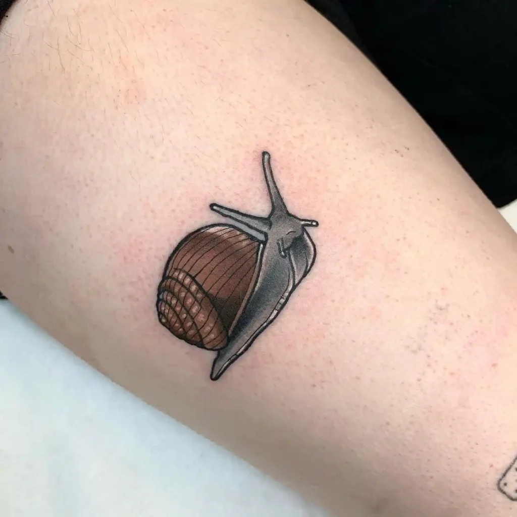 Realistic Snail Tattoo on Thigh