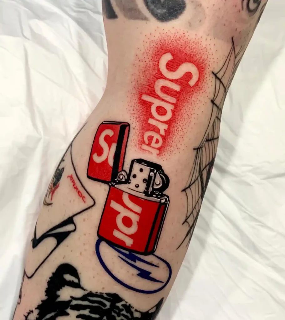 Red Supreme Brand Lighter on Leg