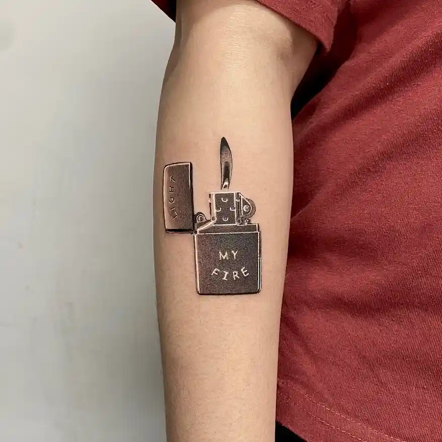 Silver Light My Fire Inscription on Forearm