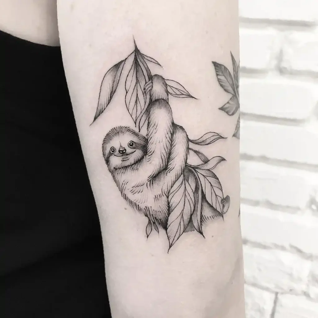 Sloth Hanging from Leaves on Inner Arm