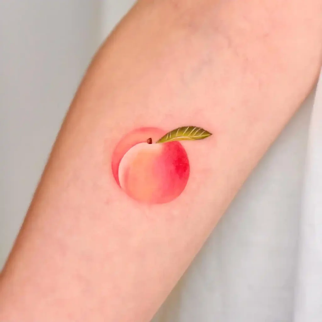 Small Peach Design on Forearm