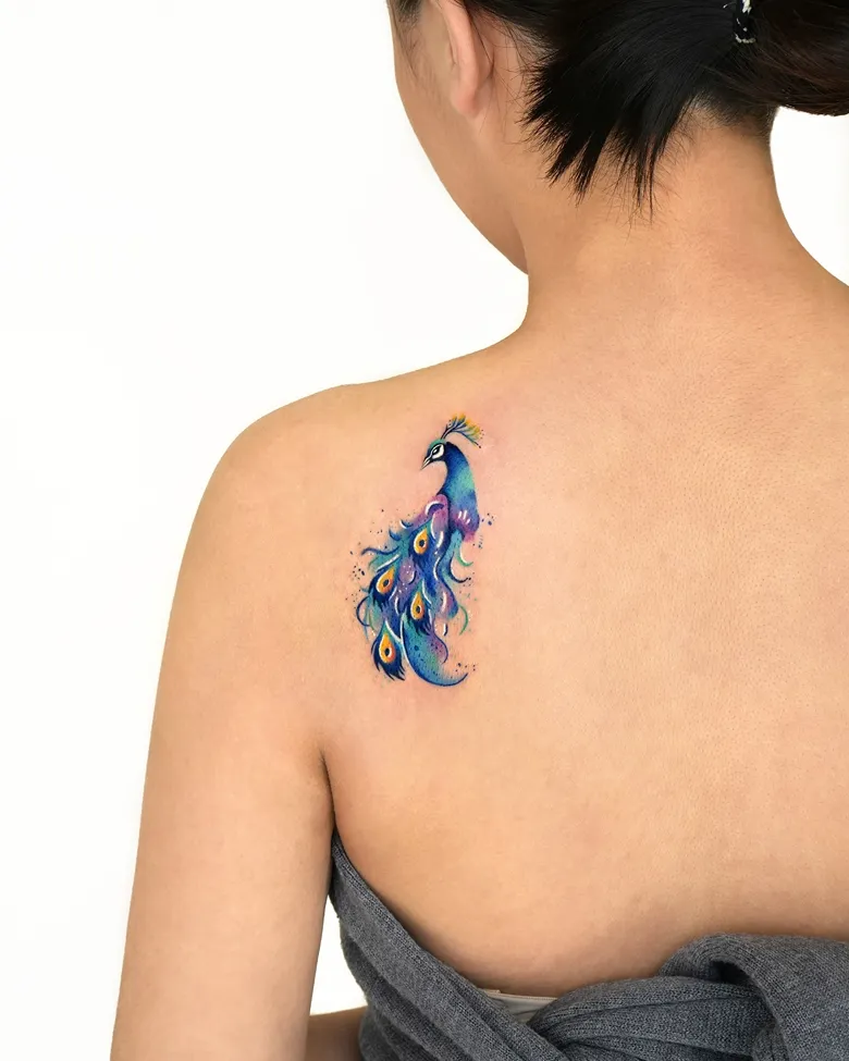 Small Watercolor Peacock Tattoo