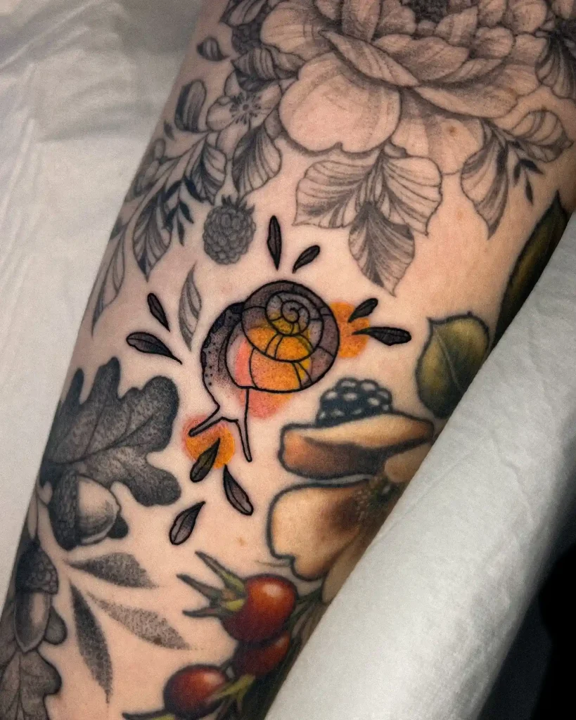 Snail and Botanical Illustration on Arm
