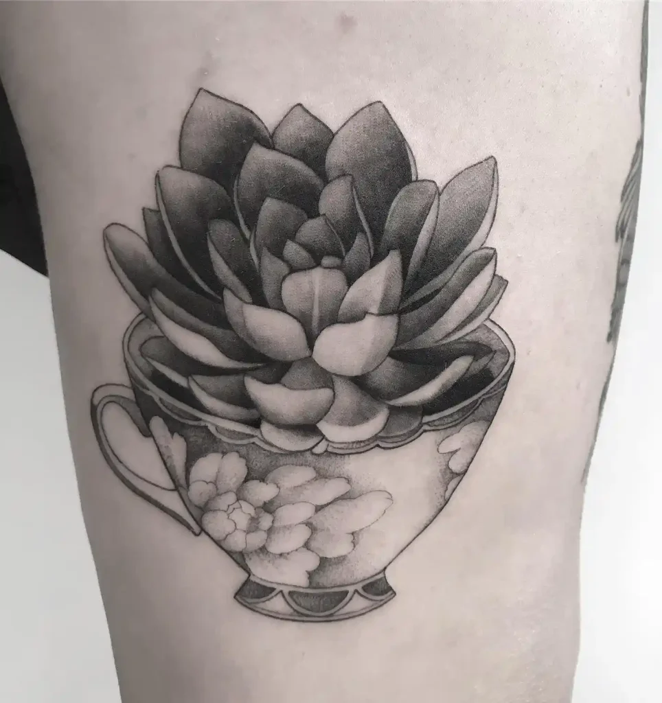 Succulent in a Floral Teacup on Upper Arm