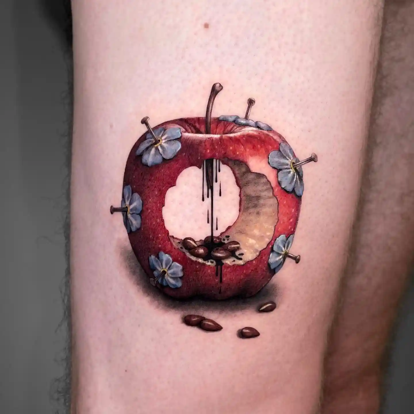 Surreal Bitten Apple with Floral Accents on Thigh
