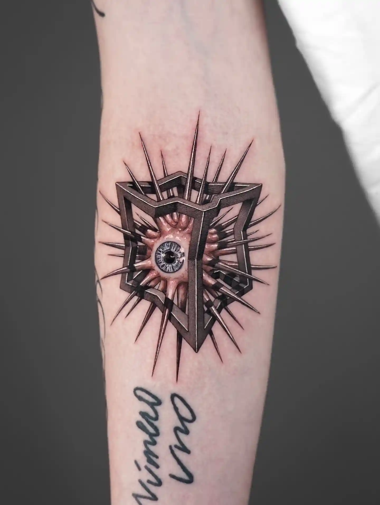 Surreal Eye in Spiked Cube on Forearm