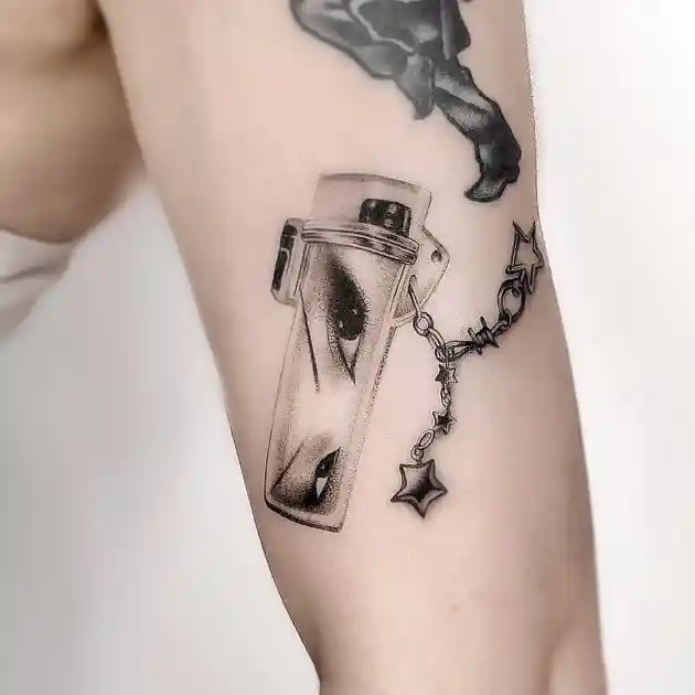 Surreal Transparent Lighter with Eyes on Forearm