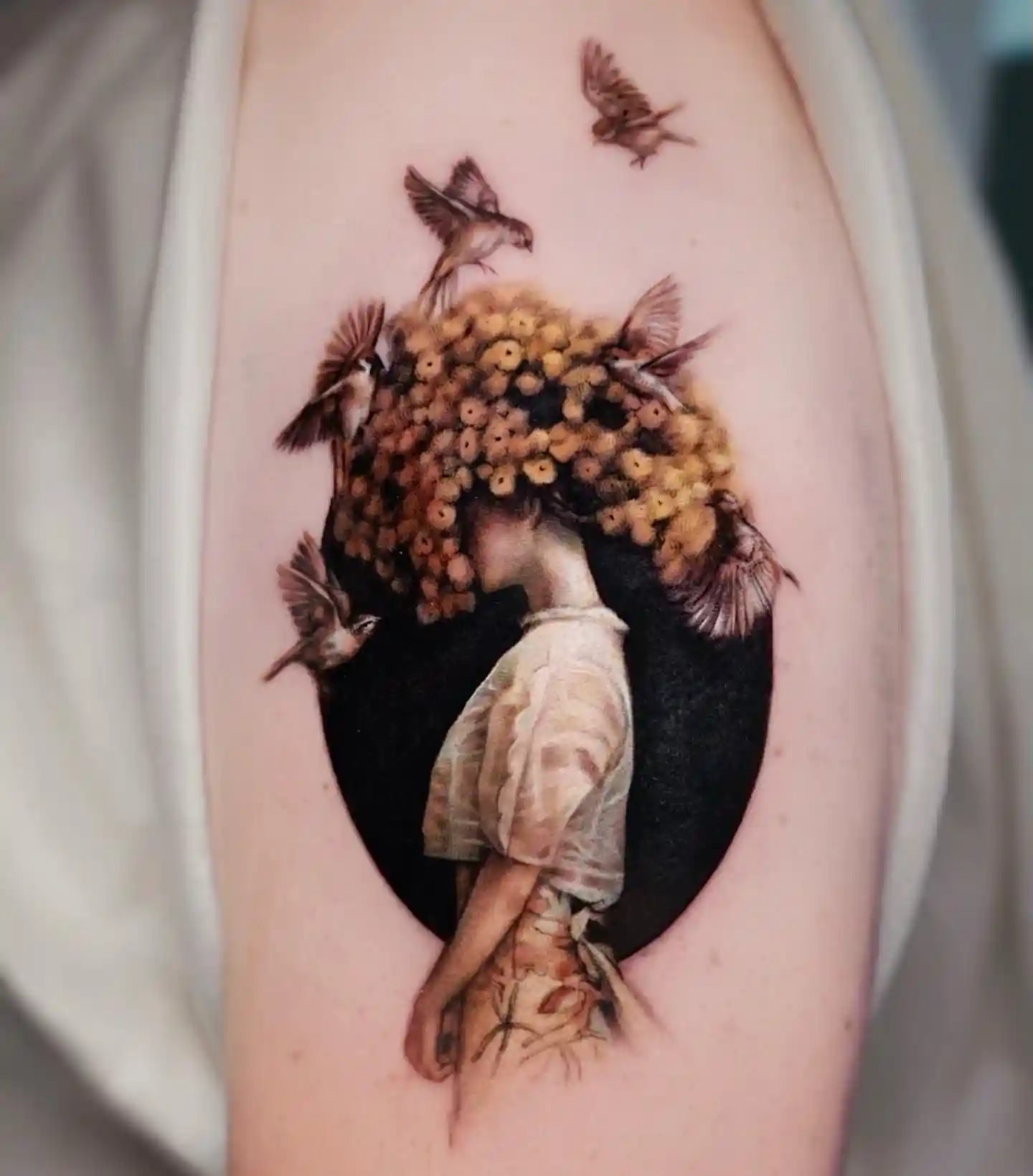 Surreal Woman with Floral Hair on Upper Arm
