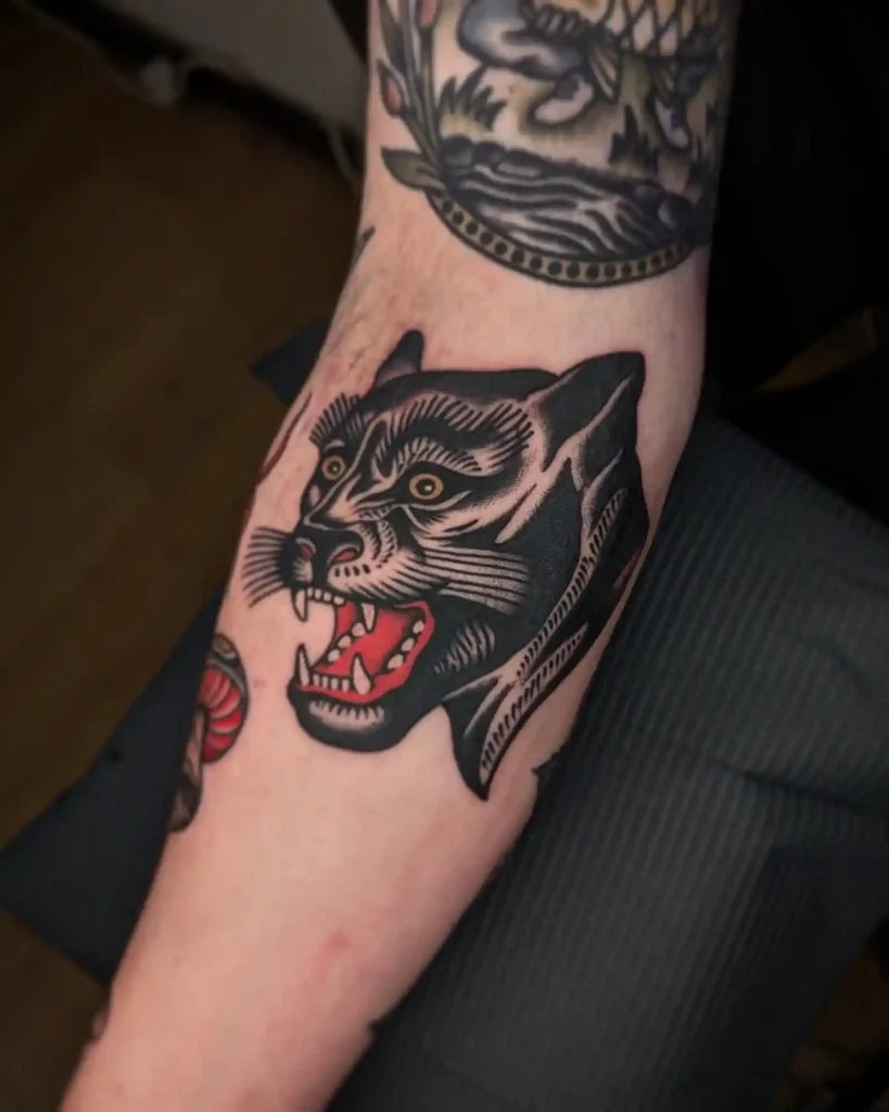 Traditional Snarling Panther Head on Forearm