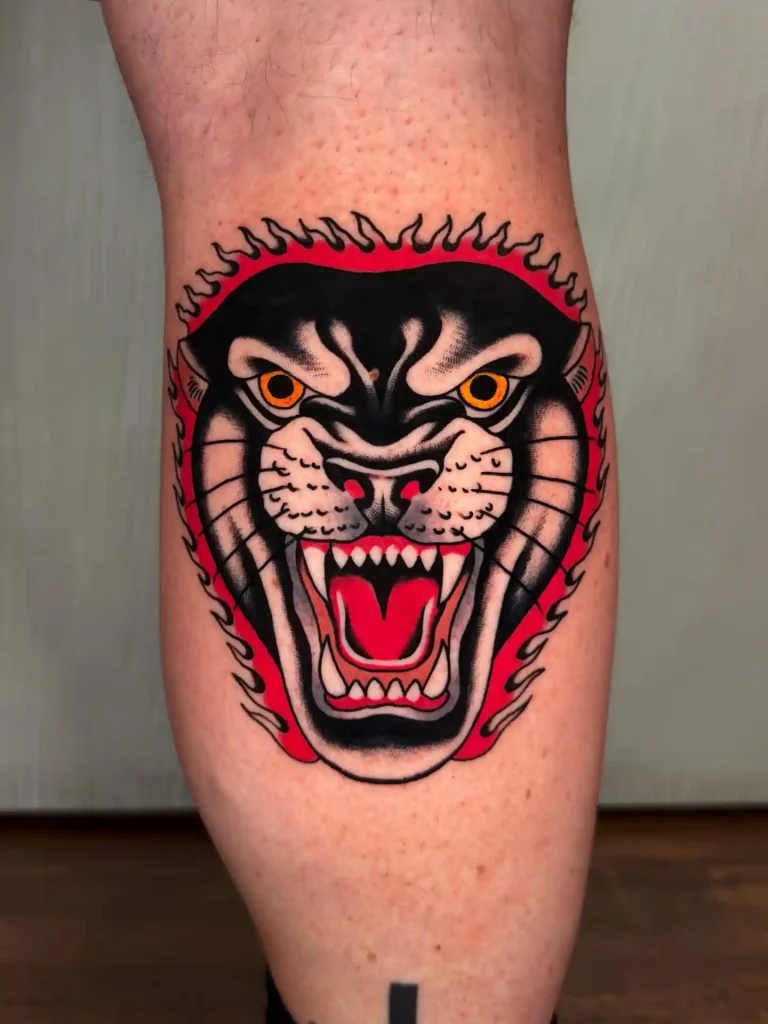 Traditional Snarling Panther Head on Lower Leg
