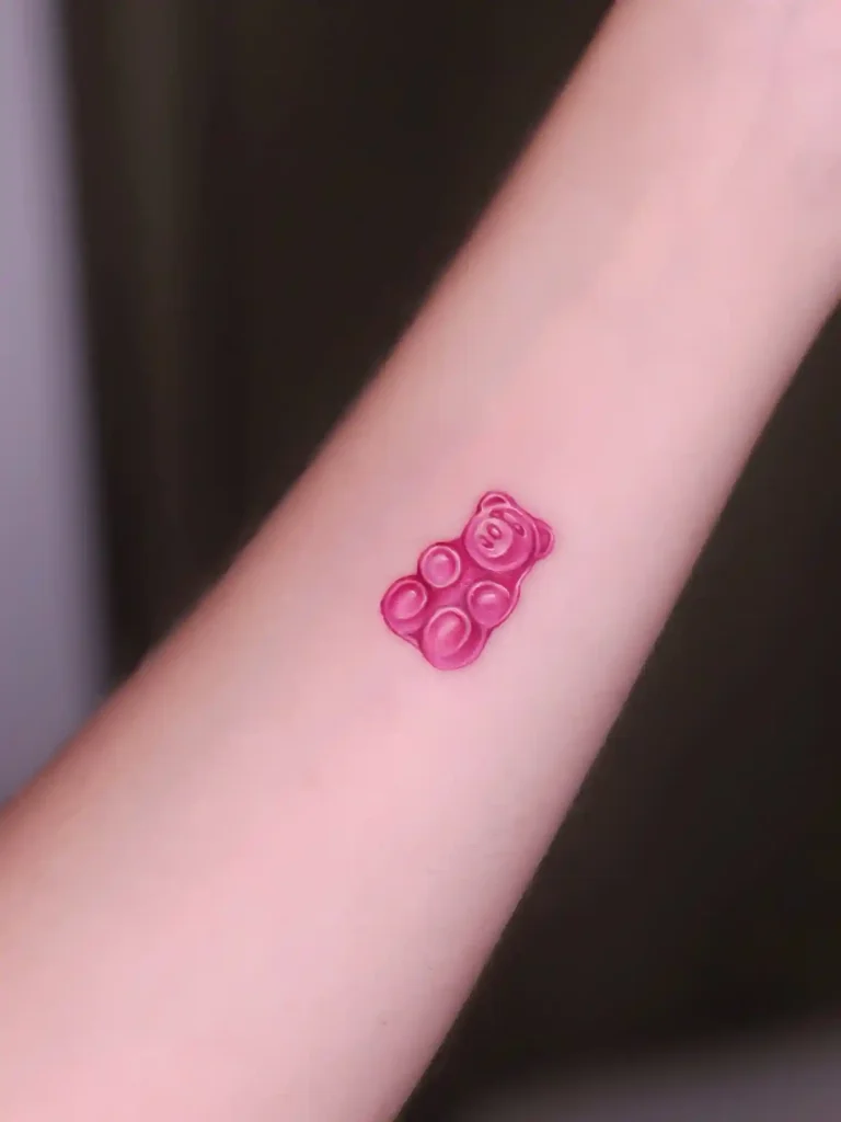 Translucent Pink Gummy Bear on Arm