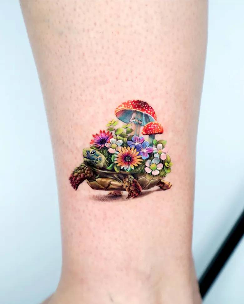 Whimsical Turtle Tattoo with Mushrooms and Wildflowers