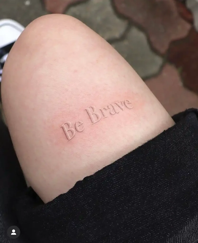 White Ink Be Brave Quote on Thigh