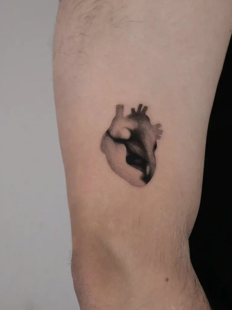 Anatomical Heart Tattoo on Upper Arm