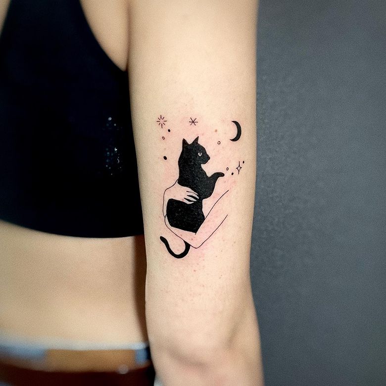 Artistic Black Cat Embrace Tattoo