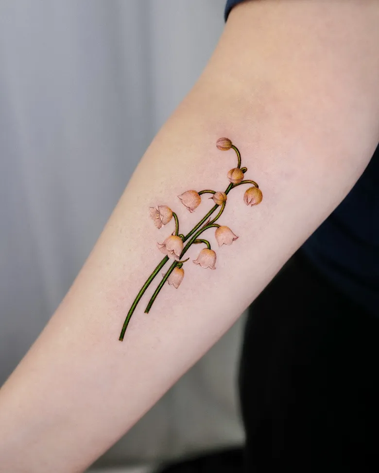 Beautiful Lily of the Valley Realism Forearm Tattoo