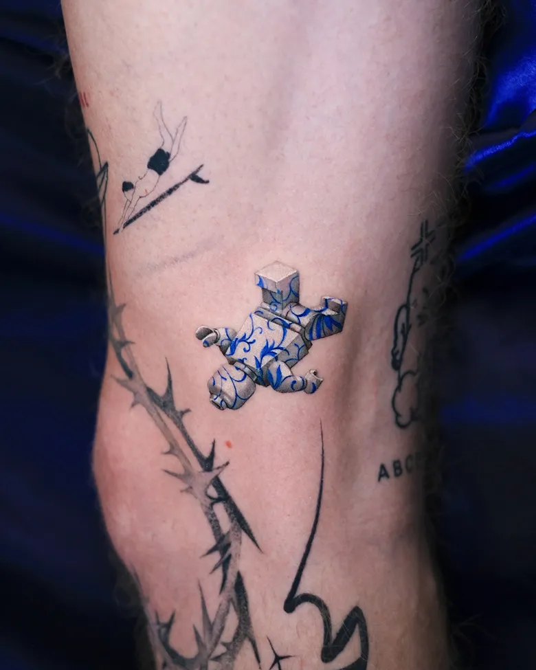 Blue Porcelain Lego Puzzle Tattoo