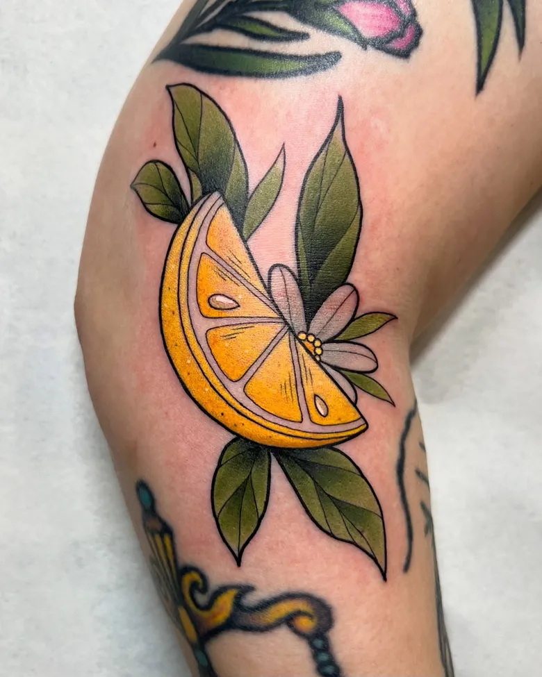 Bold Traditional Lemon Slice Tattoo