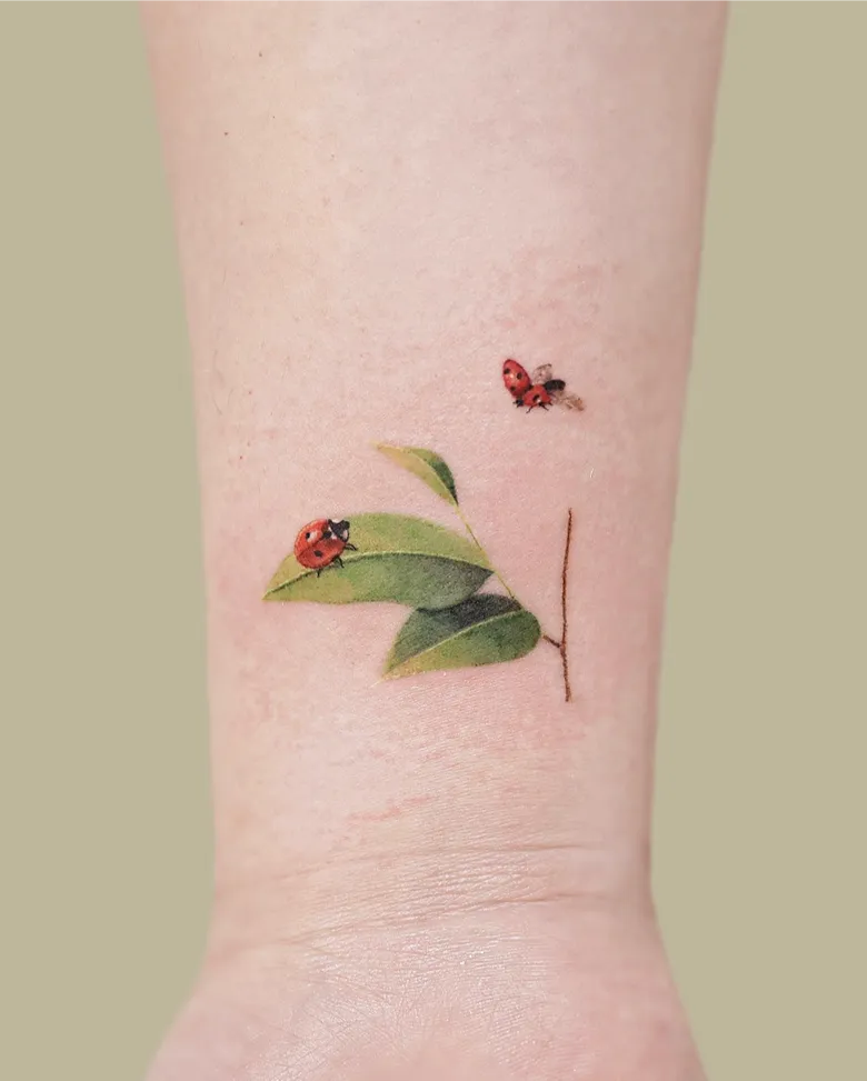 Botanical Ladybug Branch Tattoo