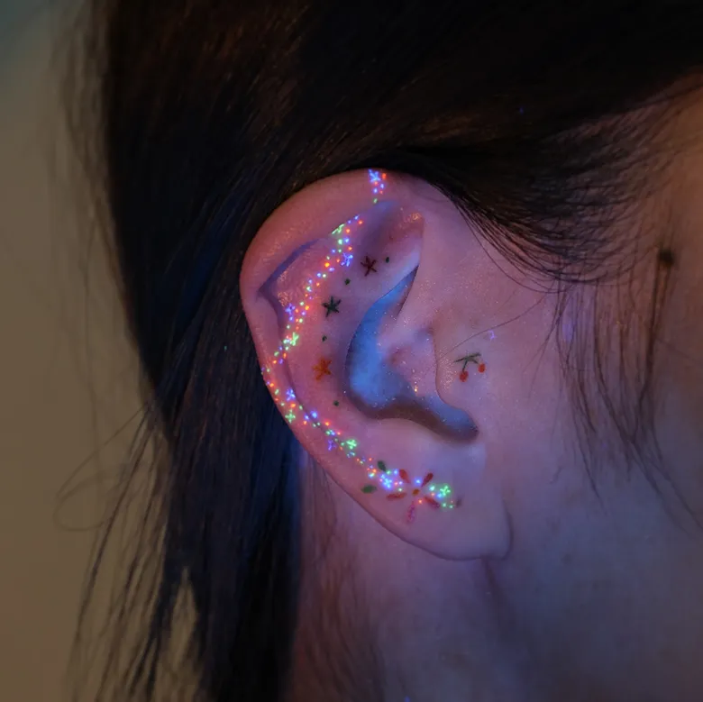 Cherry Ear UV Tattoo