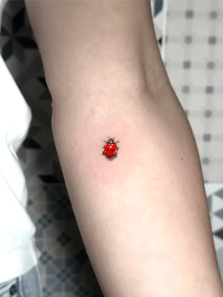 Classic Tiny Red Ladybug Tattoo