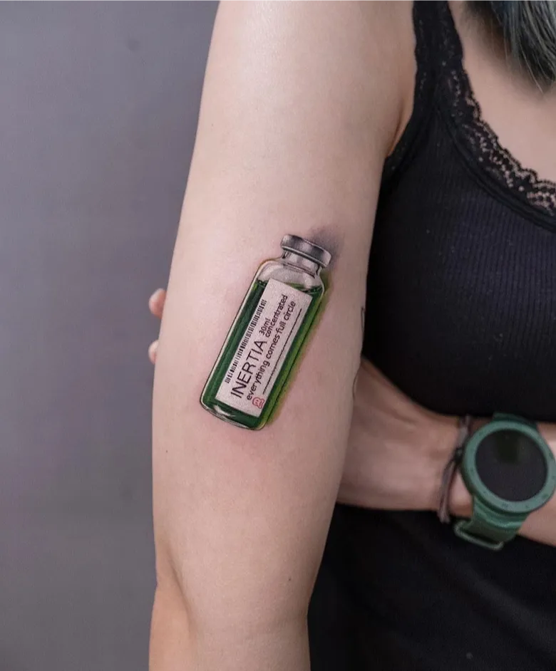 Clever Hyperrealistic Inertia Bottle Tattoo