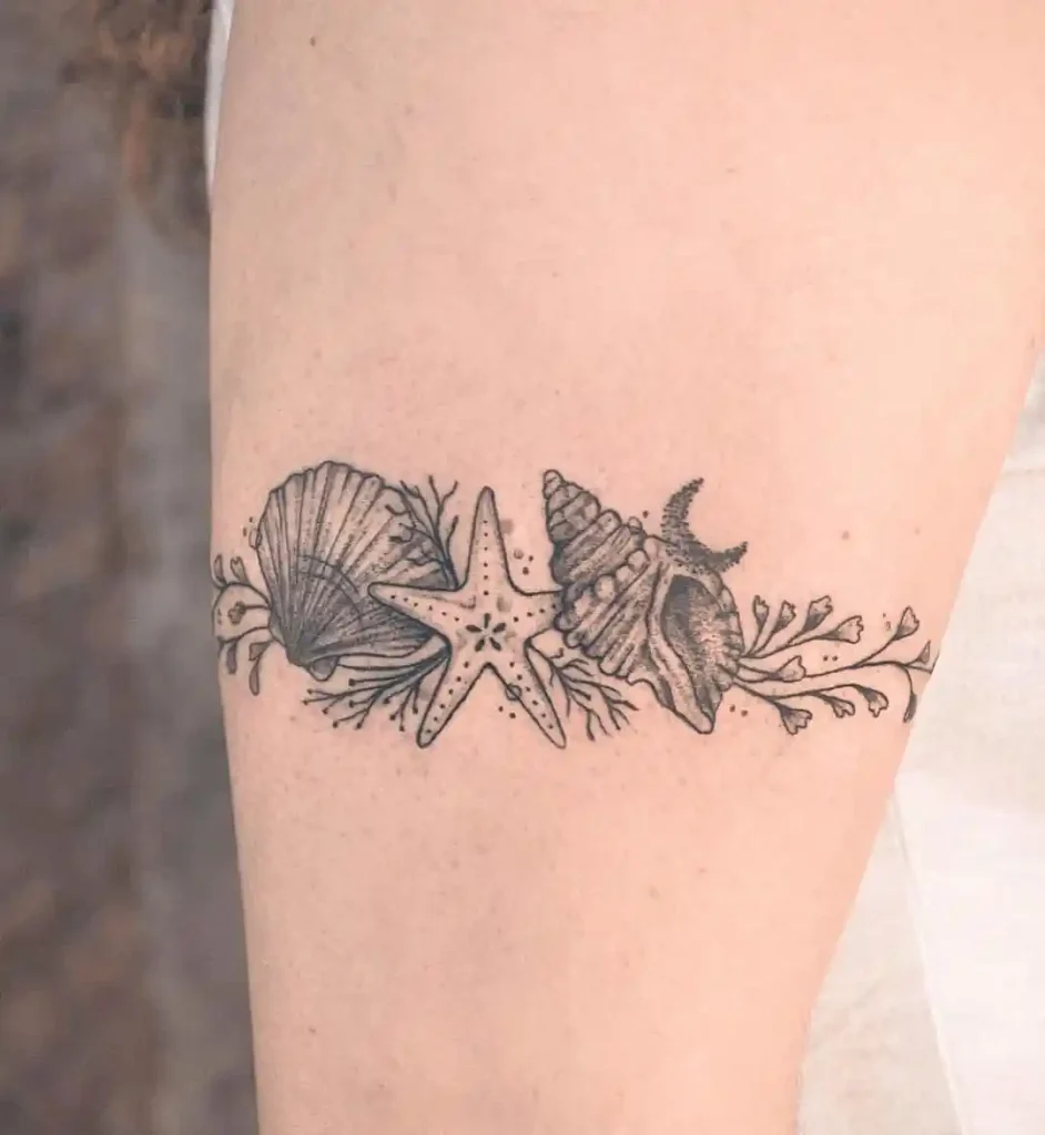 Coastal Treasures and Sea Life on Upper Arm