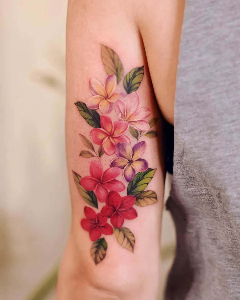 Color Cascade Plumeria Sleeve Tattoo