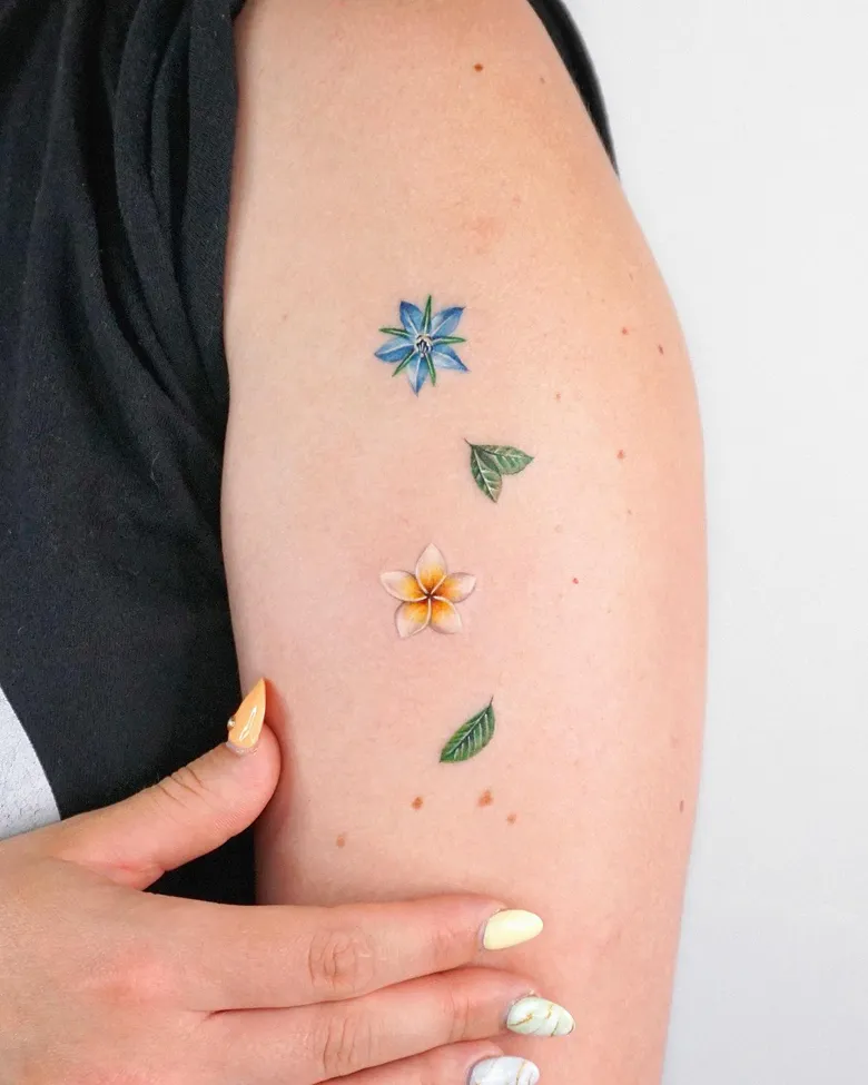 Colorful Mixed Floral Upper Arm Tattoo
