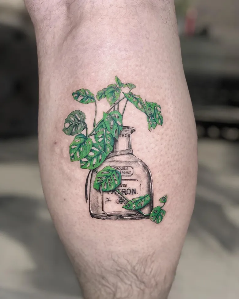 Creative Bottle and Monstera Tattoo