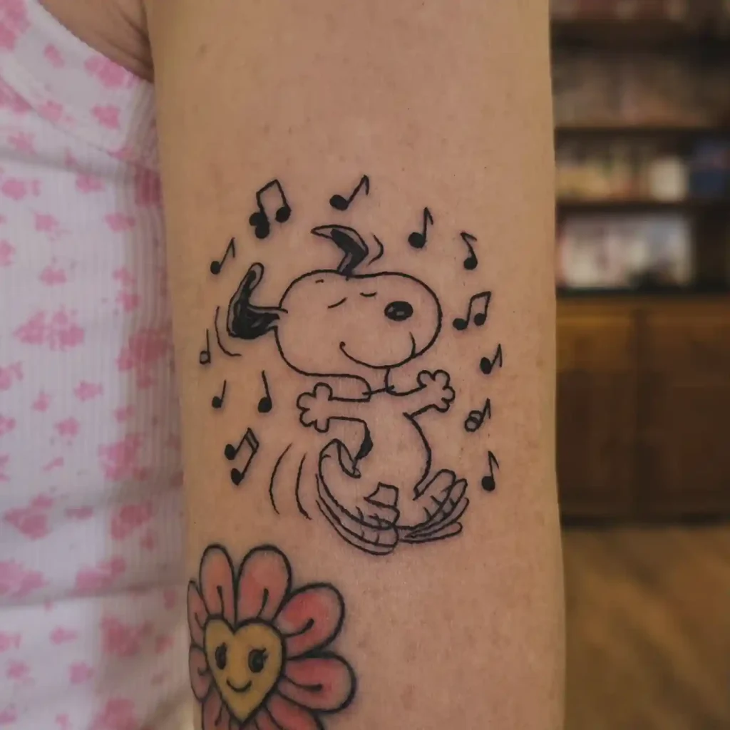 Dancing Snoopy with Music Notes on Arm