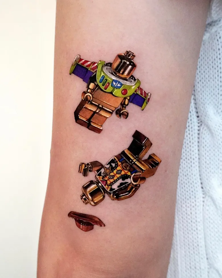 Deconstructed Buzz and Woody Lego Tattoo