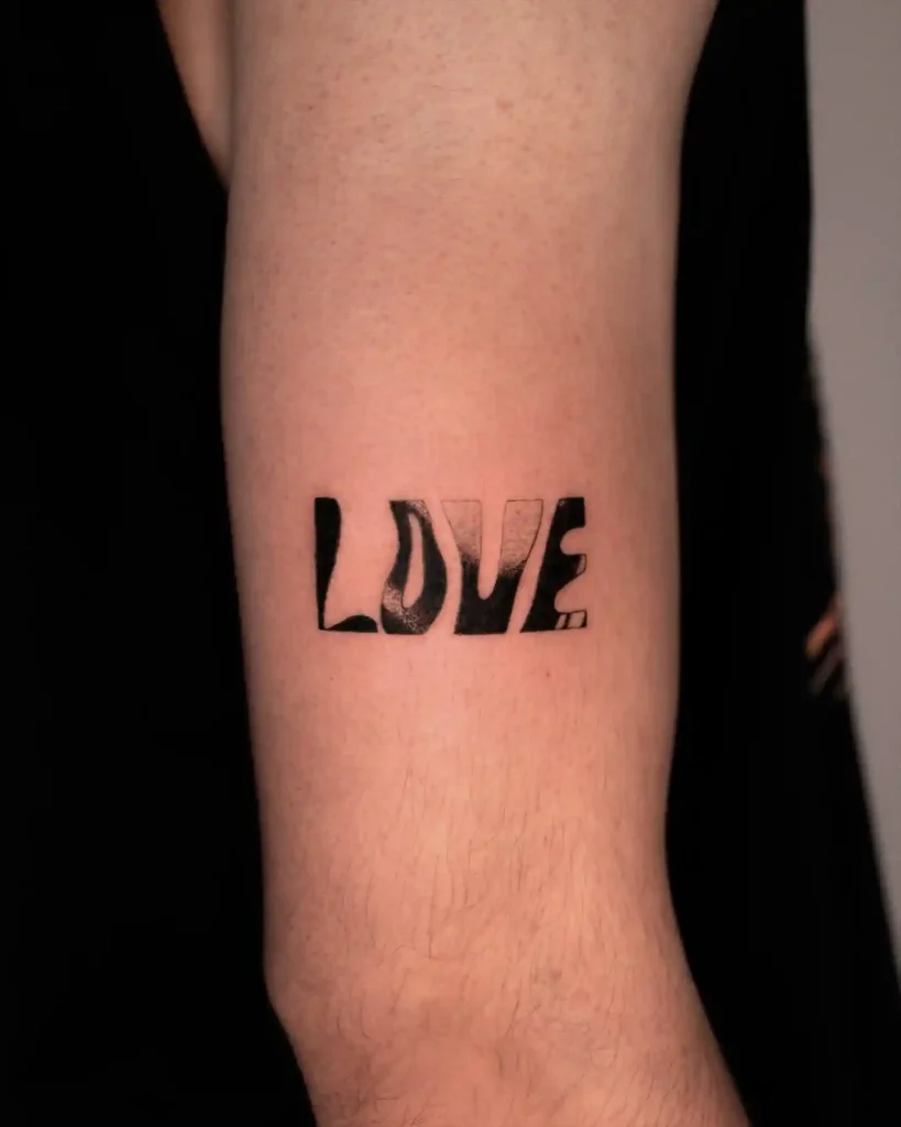 Distorted Love Text on Forearm