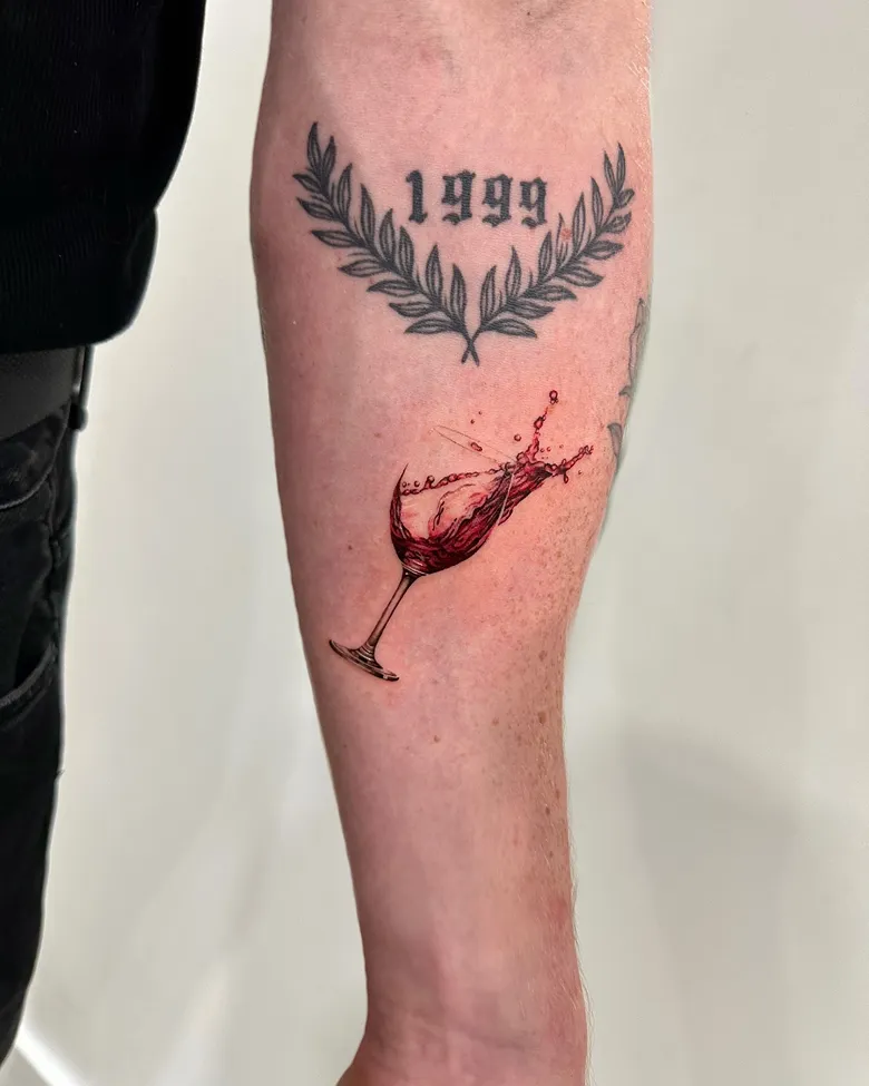 Dramatic Realistic Wine Splash Glass Tattoo