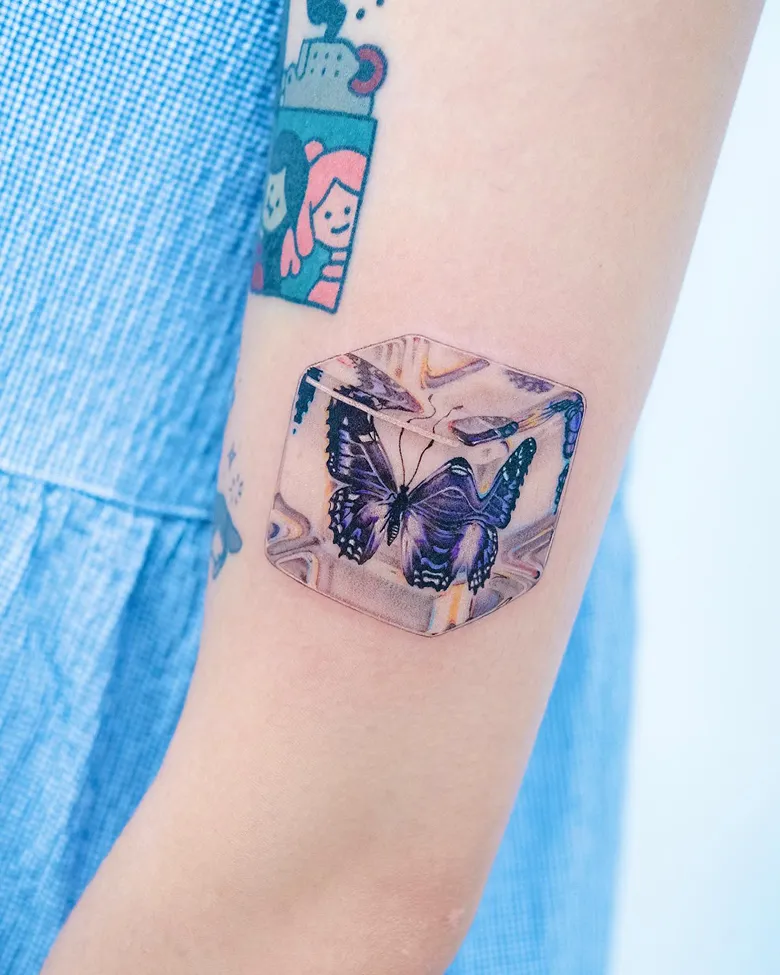 Dreamy Hyperrealistic Ice Cube Butterfly Tattoo