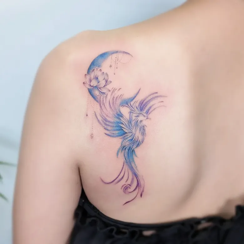 Dreamy Moonlit Phoenix Tattoo With Lotus Grace