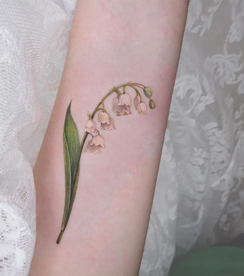 Elegant Lily of the Valley Forearm Tattoo