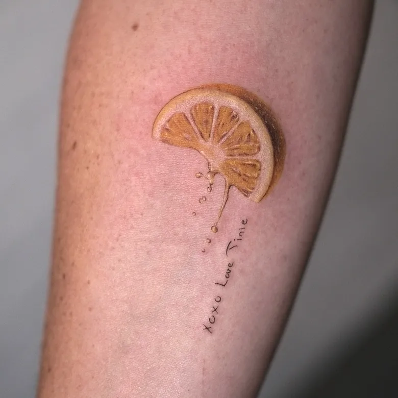 Fine Line Dripping Lemon Slice Tattoo