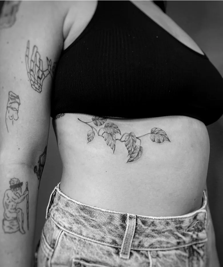 Fine Line Vine Rib Tattoo